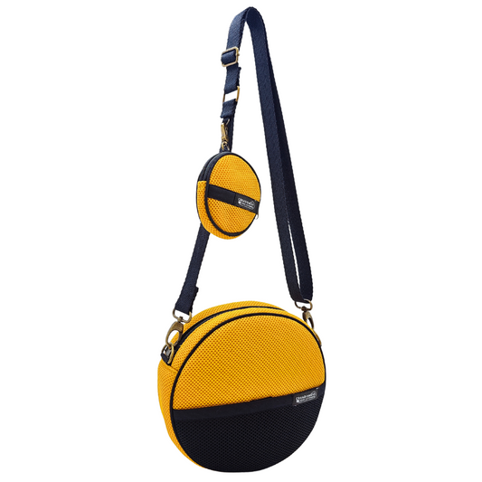 Compra nuestro bolso circular con monedero amarillo, hechos a mano con tejido 3D y material reciclado, elaborado artesanalmente por las mujeres del Programa Social de Creadoness.