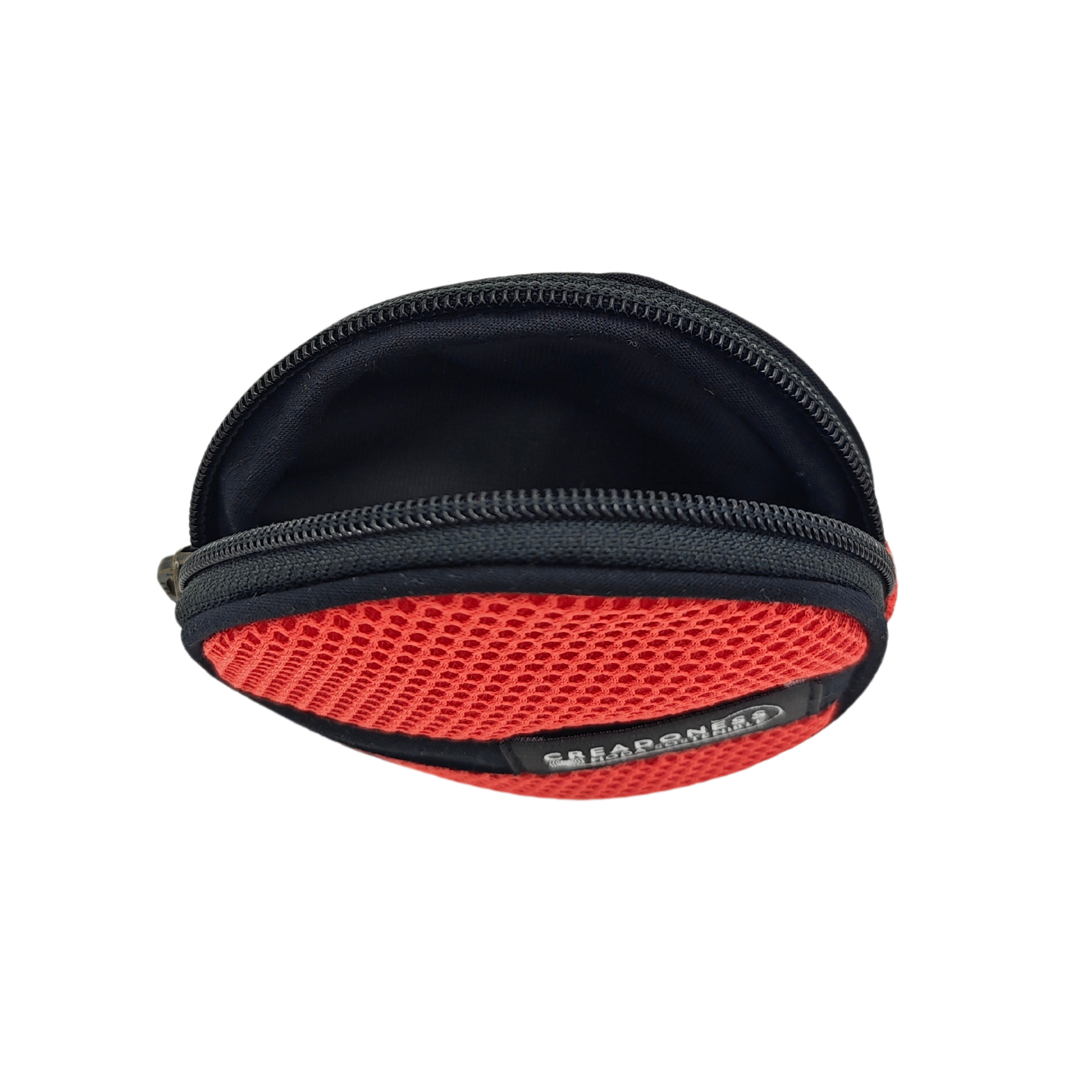 Compra nuestro monedero salmón hecho a mano con tejido 3D y material reciclado, elaborado artesanalmente por las mujeres del Programa Social de Creadoness.