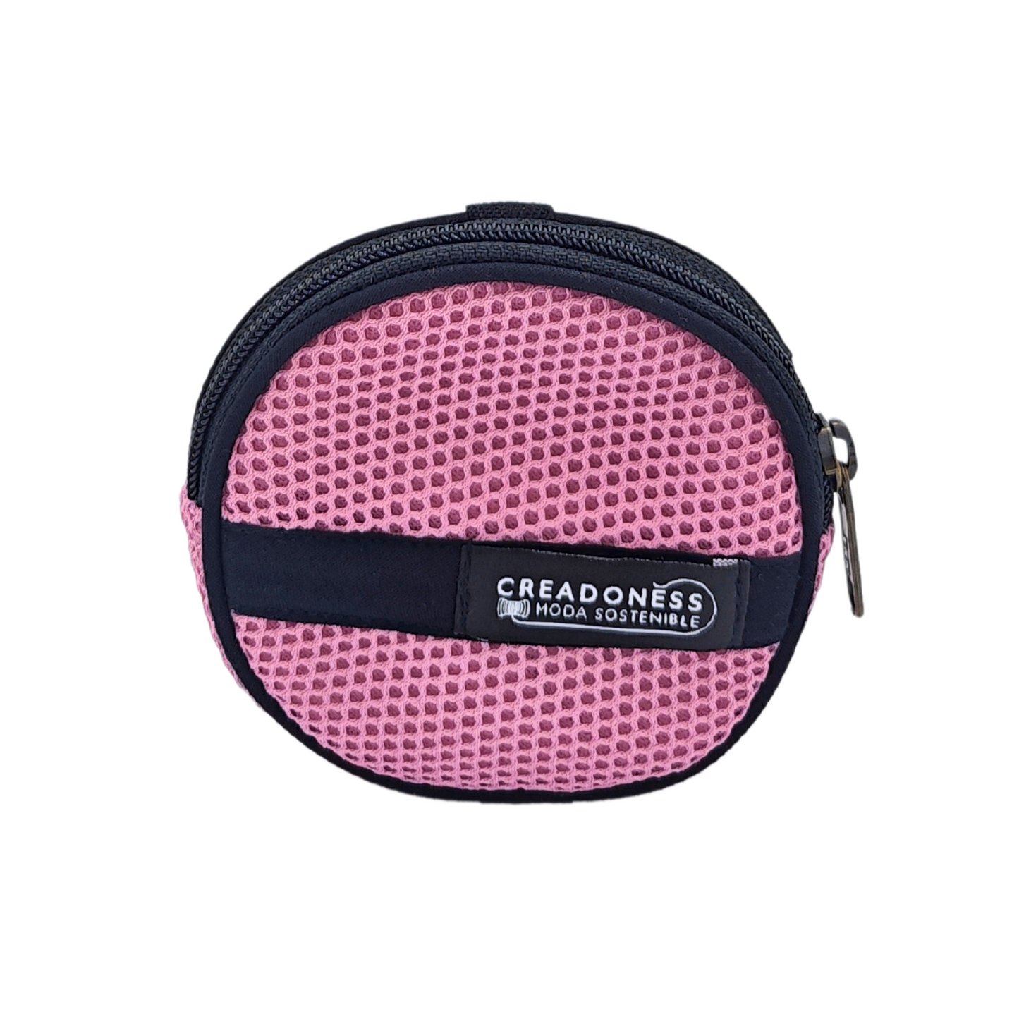 Compra nuestro monedero rosa hecho a mano con tejido 3D y material reciclado, elaborado artesanalmente por las mujeres del Programa Social de Creadoness.