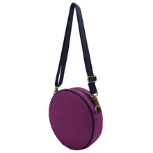 Load image into Gallery viewer, Compra nuestro bolso circular violeta, hecho a mano con tejido 3D y material reciclado, elaborado artesanalmente por las mujeres del Programa Social de Creadoness.
